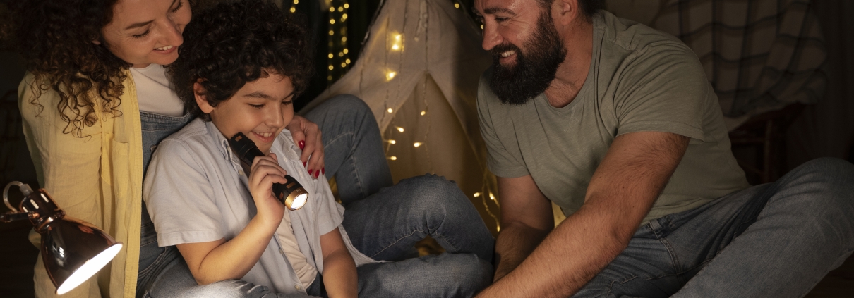 close-up-child-reading-with-his-parents. They train up and shape his life in God's word