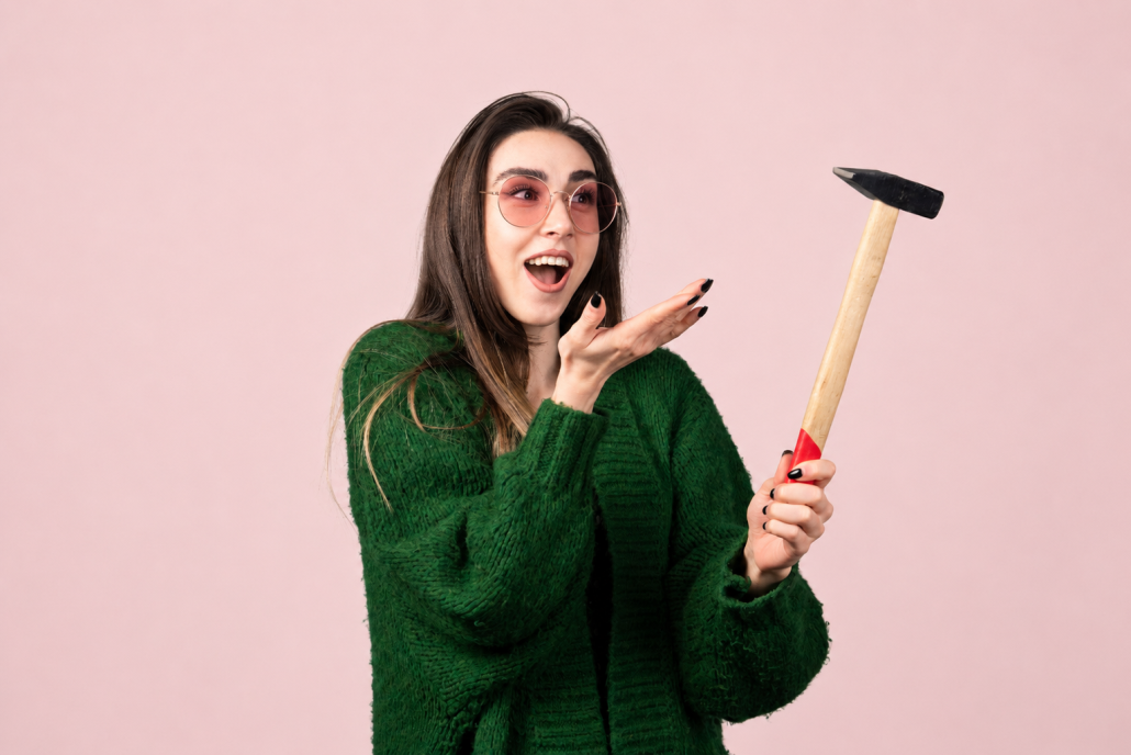 Woman with hammer jumping to conclusions