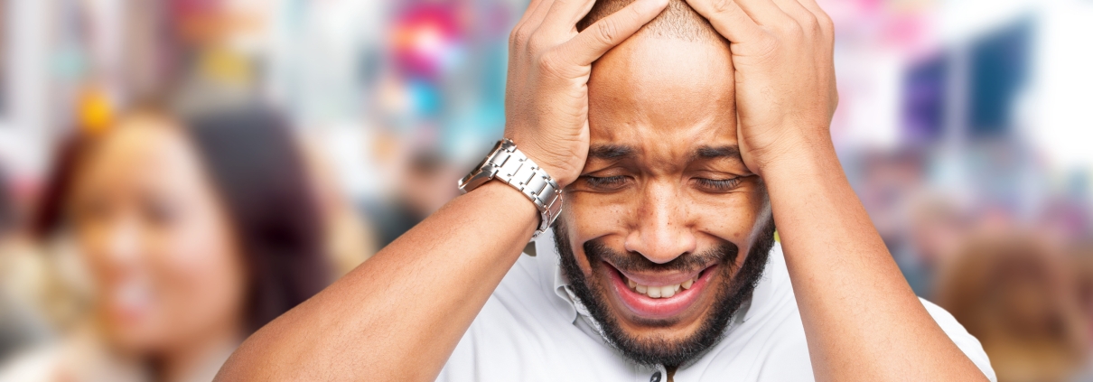 black businessman has a sad expression because he was relying on the unfaithful in his day of trouble