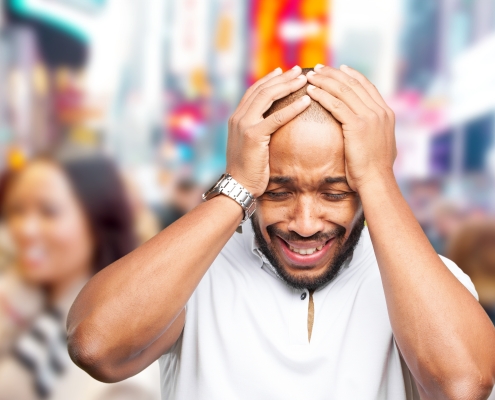 black businessman has a sad expression because he was relying on the unfaithful in his day of trouble