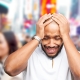 black businessman has a sad expression because he was relying on the unfaithful in his day of trouble