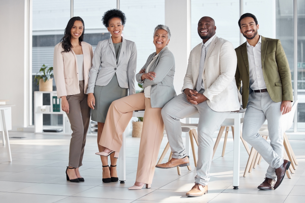 Team, diversity and portrait of business people in the office posing together after a biblical business and investment