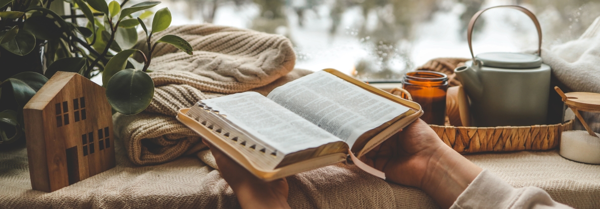 Girl holding a Bible, morning prayer and worship. biblical self-love