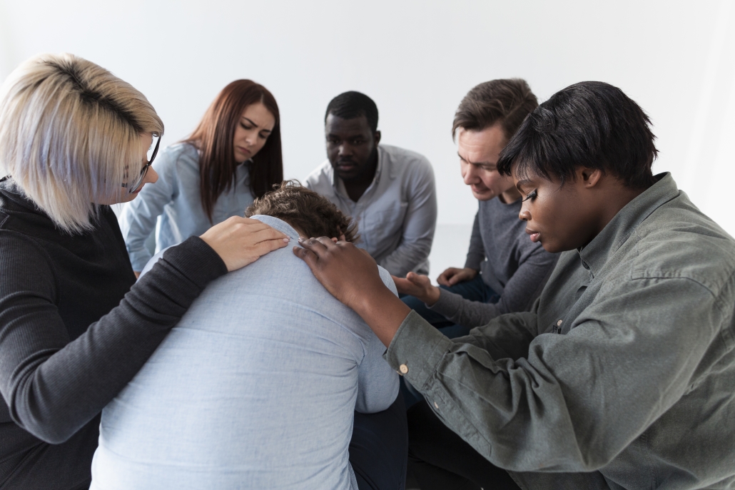 people praying for each other while they keep christ central